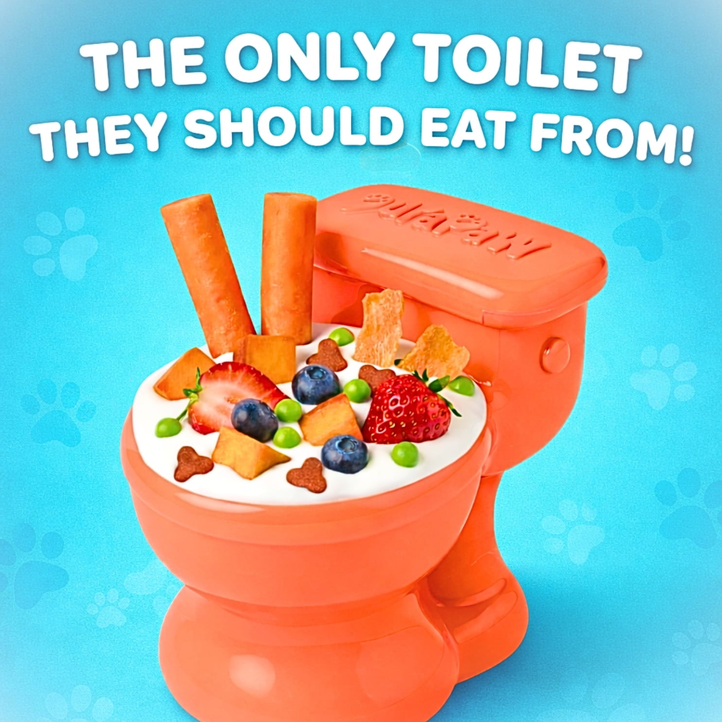 Orange DuraPaw dog toy rubber toilet slow feeder with pet safe food items on a blue background