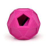 Hot pink rubber disco ball dog toy with treat dispensing hole, geometric texture design