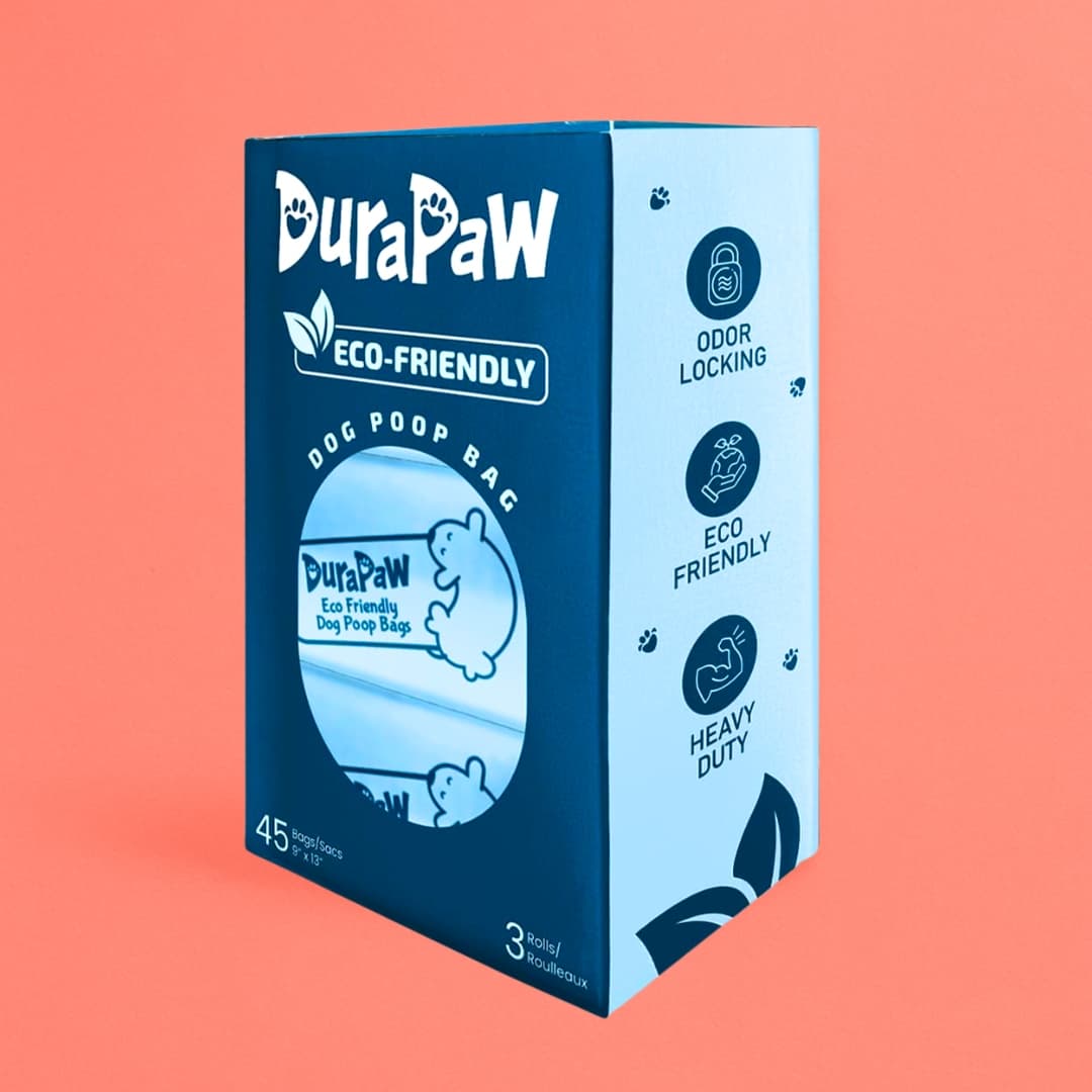 Box of DuraPaw eco-friendly dog poop bags on a peach background