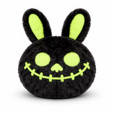 DuraPaw Glow in the Dark black plush bunny toy with green eyes and mouth on a white background