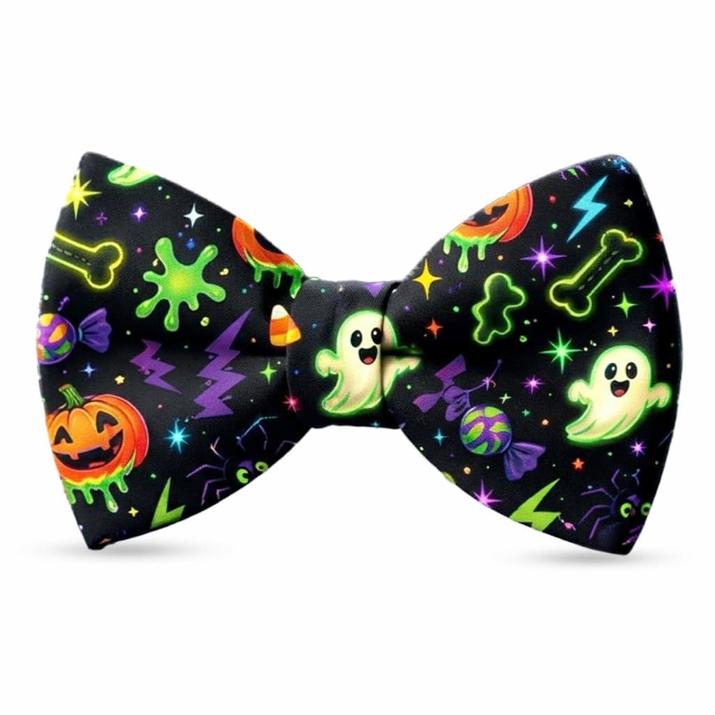 Halloween-themed bow tie with ghosts, pumpkins, and candy on a white background