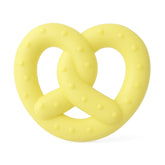 Yellow pretzel-shaped DuraPaw teething dog chew toy on a white background