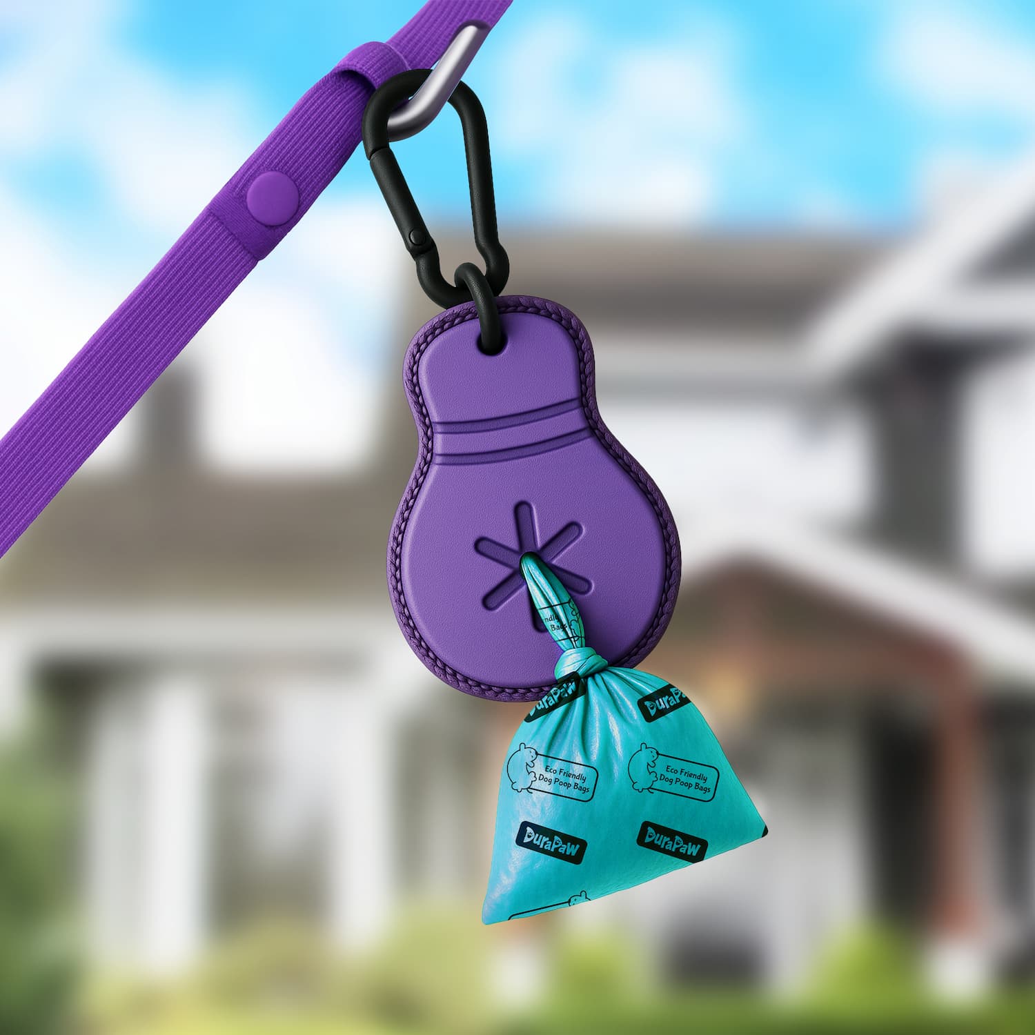 A purple DuraPaw dog waste bag dispenser attached to a leash, with a supply of blue waste bags visible.
